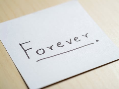 Forever note personal reflection home office minimalist close-up emotional connection photo