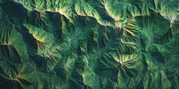 Lush Green Mountain Range Aerial View Nature Texture Background photo