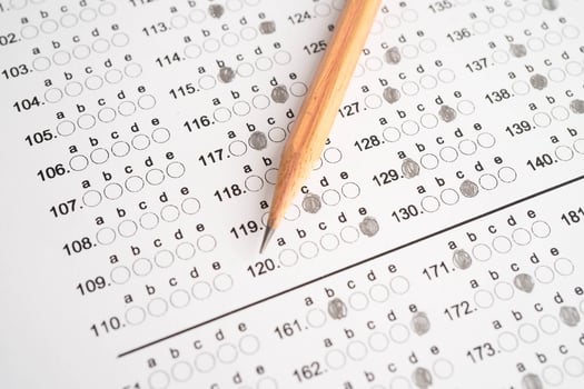 Answer sheets with pencil drawing fill to select choice, education. photo