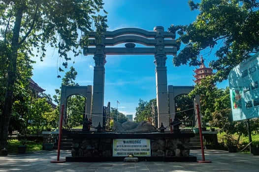 The serene Watu Gong Pagoda gate, surrounded by greenery and a clear sky, captures tranquility and heritage, often linked to Lunar or Chinese New Year. Indonesia, 17 November 2024 photo