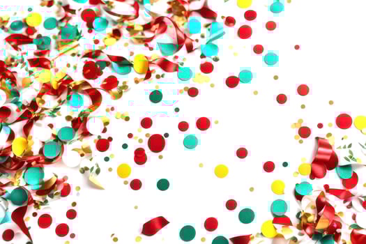 Festive background of multicolored scattered confetti. photo