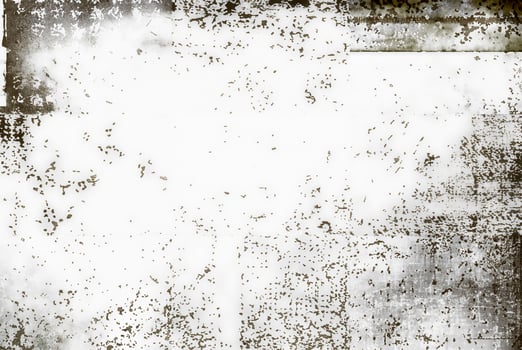 Grunge abstract texture featuring a distressed border with scattered speckled patterns on a white background, ideal for overlays and backgrounds. photo