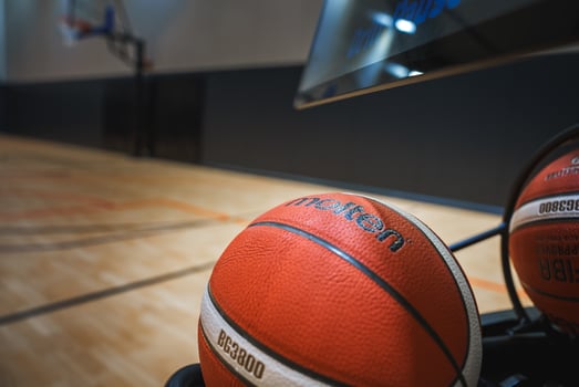 Close Up of Molten Basketball on Cart in Indoor Sports Facility photo