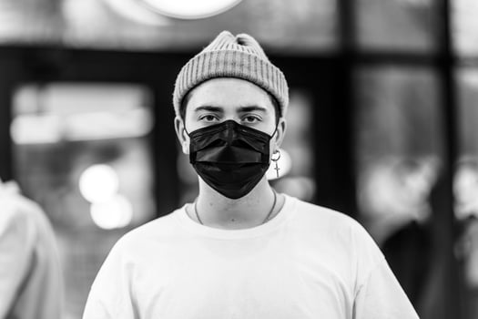 A man puts on a mask from a virus. Flu epidemic. photo