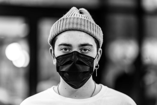 A man puts on a mask from a virus. photo