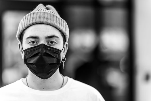 A man puts on a mask from a virus. photo