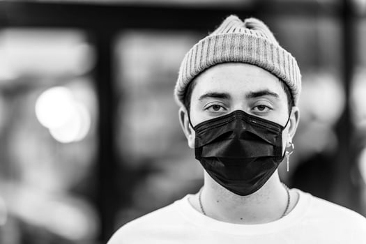 A man puts on a mask from a virus. photo