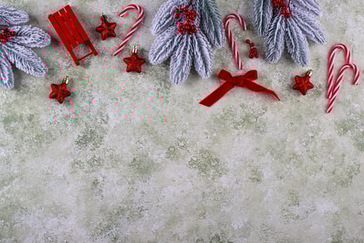 Festive christmas decorations on snowy background photo