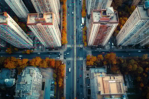 Aerial view of city intersection with autumn foliage. photo