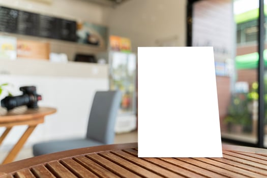 Modern Cafe Ambiance Barista's Corner with Espresso Machine Coffee Beans and Blank Business Cards photo