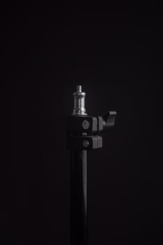 Lighting affordable photography stand product isolated on black background photo
