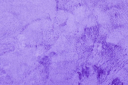 Texture of rough violet plaster. Architectural abstract background. photo