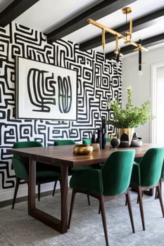 Modern dining area featuring bold wall art and stylish green chairs in a contemporary home photo