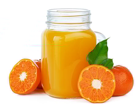 Glass of orange juice isolated on white photo