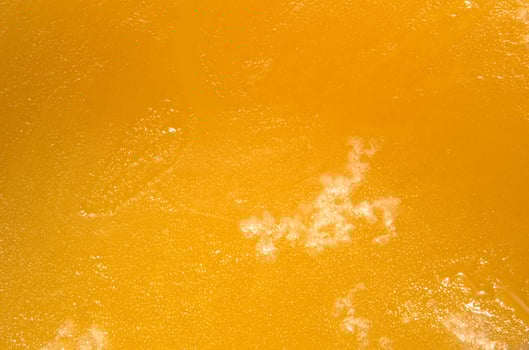 Macro of creamy honey seen from above photo