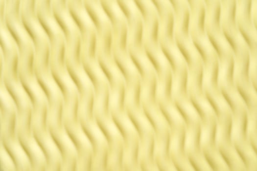 Abstract yellow wavy pattern background with textured surface and repetitive design. photo