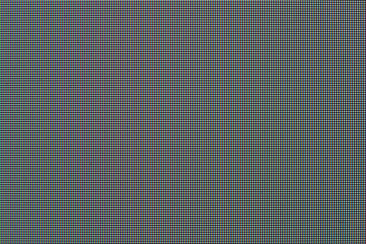 Close up of lcd display with red, green and blue dots photo