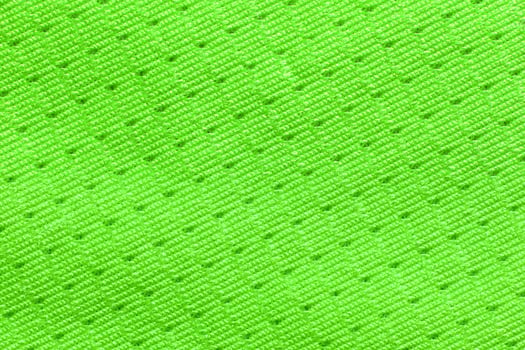 Bright neon green textured fabric with intricate zigzag pattern for fashion and design. photo