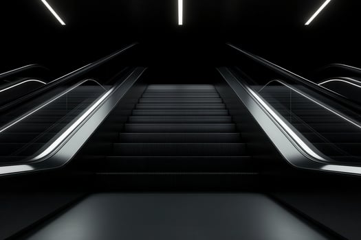 Escalator leading to an upper level in an underground station with modern lighting design at nighttime photo