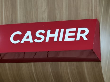 cashier sign in store. customer checkout. photo