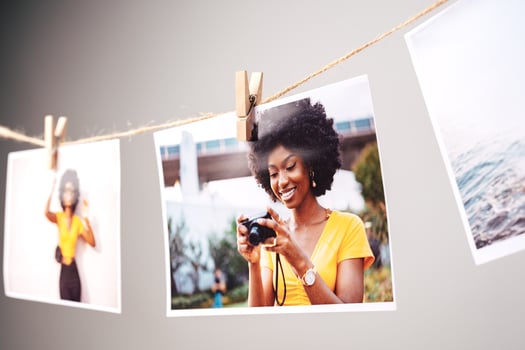 Printed colorful photos of women portraits against gray background