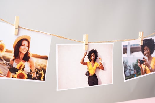 Printed colorful photos of women portraits against gray background