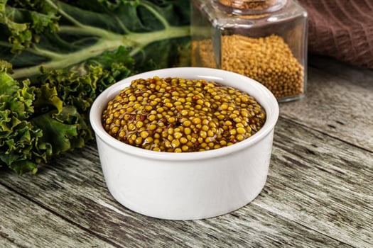 Mustard sauce with seeds in the bowl photo