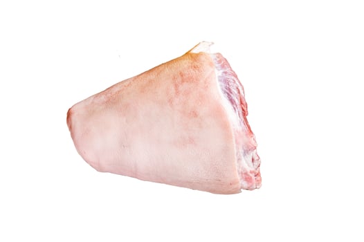 Fresh Raw pork shank knuckle on a butcher board with herbs for cooking. Isolated, white background. photo