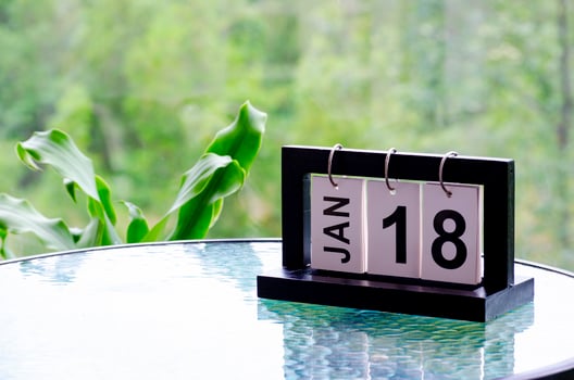 18 January calendar table with blurred nature background. With customizable space for text or ideas photo