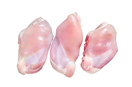 Boneless Raw Chicken thigh fillet. Isolated on white background, top view. photo