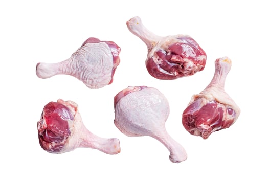 Raw Duck legs drumsticks Isolated on white background, top view. photo