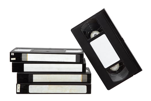Pile of VHS cassettes. Vintage media. Isolate on a white back. photo