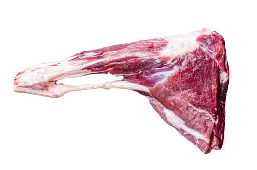Whole raw lamb leg meat on the bone. Isolated, white background. photo