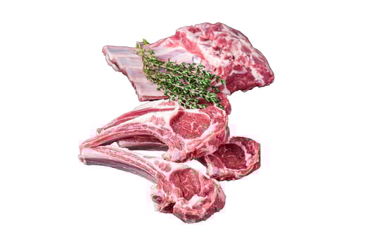 Fresh Raw lamb meat chop steaks on kitchen table with spices and herbs. Isolated, white background. photo