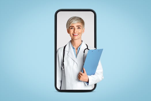 Visit to doctor concert. Friendly woman doctor in white coat and tablets in hand, isolated on light background, studio shot photo