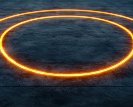 Glowing rings on a dark surface photo