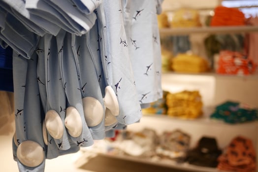 Clothing security tag on a shirt , photo