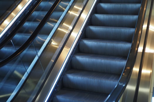 A Closeup Perspective of Escalators Highlighting Modern Architectural Style photo