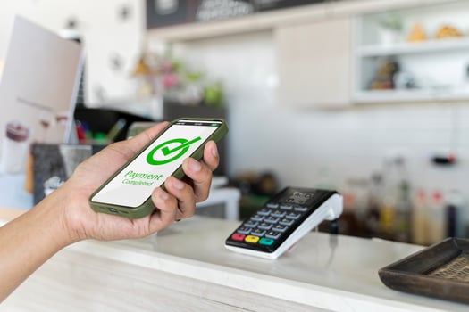 Customer using phone for payment at cafe restaurant, cashless technology and money transfer concept photo