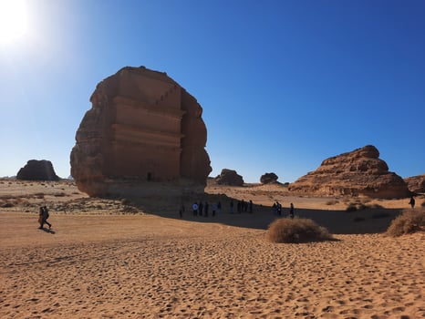 AlUla, Saudi Arabia, 29 Nov 2024 - Tourists from different countries of the world are looking at the ancient rocks and thousands of years old archeology in AlUla, Madain Saleh. photo