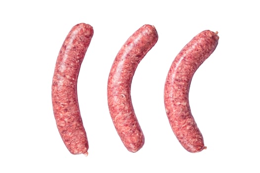 Raw beef meat sausages ready for cooking. Isolated, white background. photo
