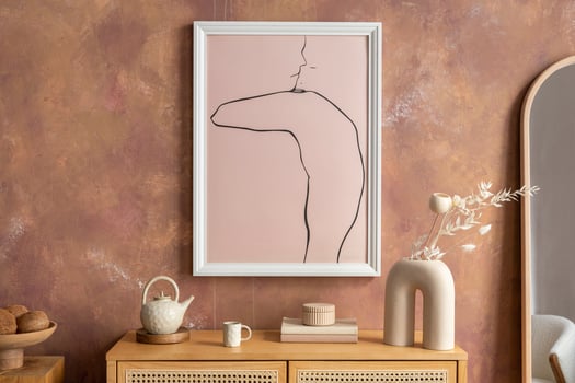 Creative composition vintage living room with rattan chest of drawers, vase with dried flowers, casket and minimalistic poster. Stylish accessories. photo