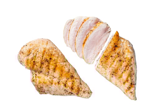 BBQ grilled and sliced chicken breast fillet steak. Isolated on white background. photo