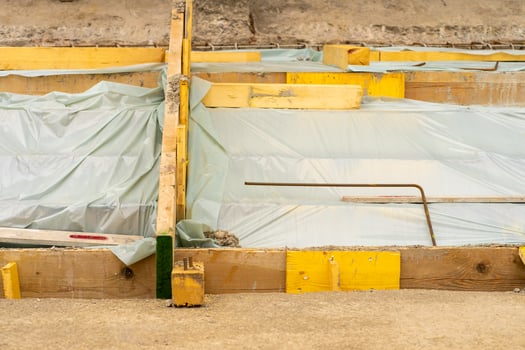 View of the construction and repair of steps near the building photo