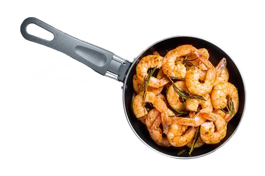 Fried with butter and garlic prawns shrimps in a skillet. Isolated on white background photo