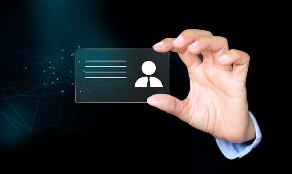 Human hand holding futuristic business card photo