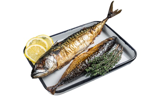 Roasted Mackerel Scomber fish in baking dish. Isolated, white background. photo