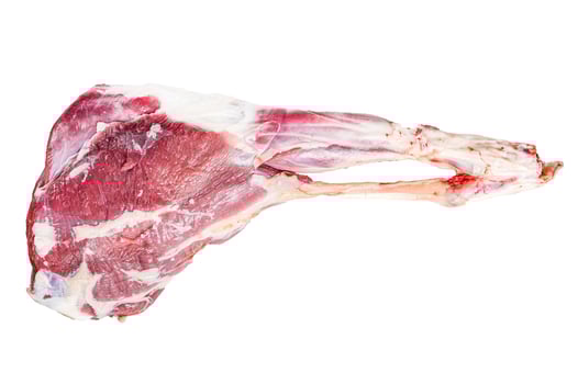 Goat leg with pepper and garlic. Raw Farm meat. Isolated, white background. photo