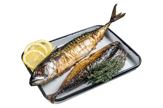 Roasted Mackerel Scomber fish in baking dish. Isolated on white background. Top view. photo