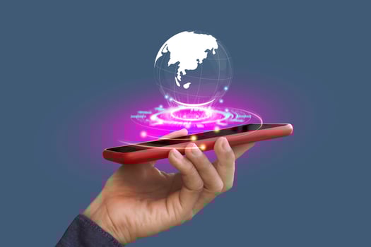 Holding smartphone with virtual Global Internet connection. Global internet connection application technology and digital marketing, Financial and banking, Digital link tech, big data. photo